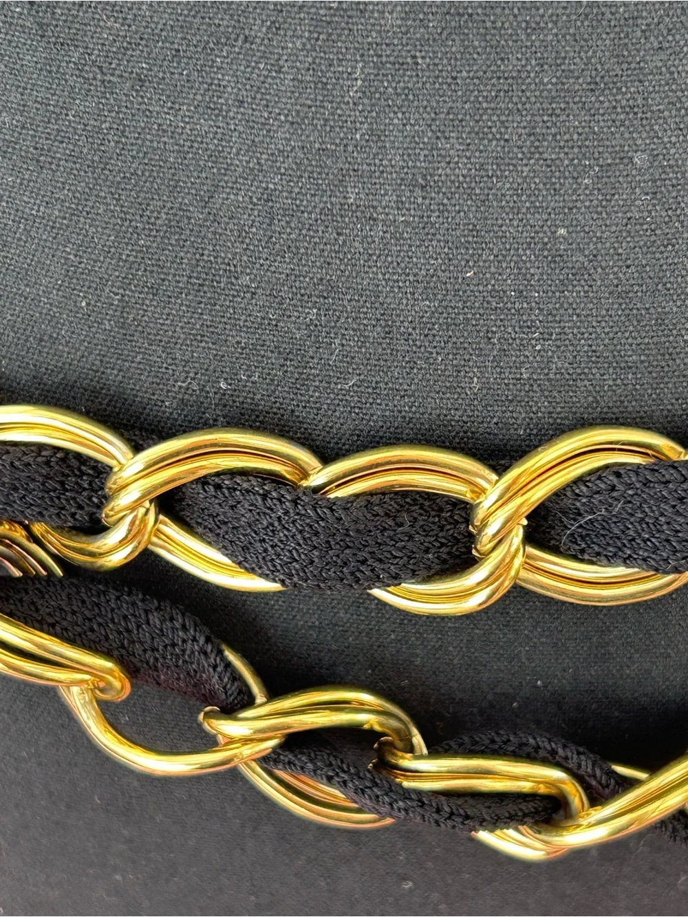 Couture style chunky gold tone and black textile woven chain belt